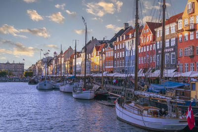 Boats moored at harbor
