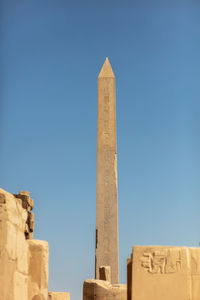 Different hieroglyphs on the walls and columns in the karnak temple.