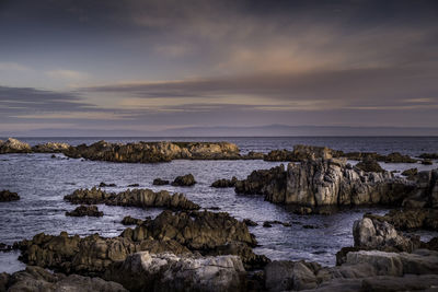 Scenic view of sea against sky at sunset