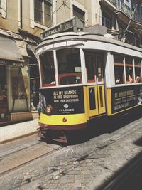 Yellow car on city street