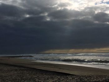 Scenic view of beach against sky