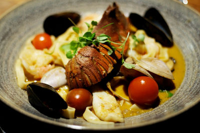 Close-up of main course served in plate