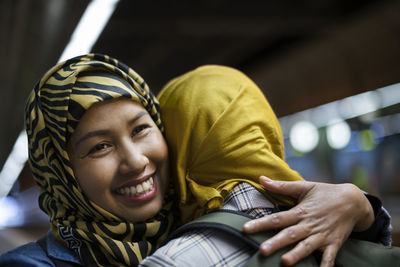 Portrait of smiling young woman