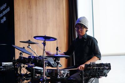 Portrait of a young man sitting outdoors