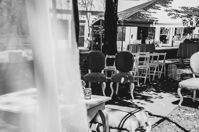 Group of people in restaurant against building