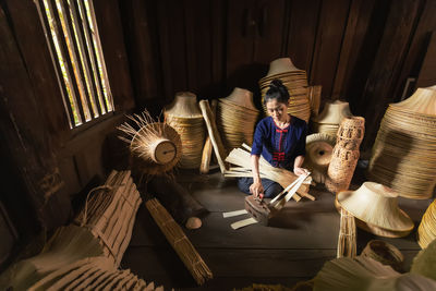 High angle view of man reading book