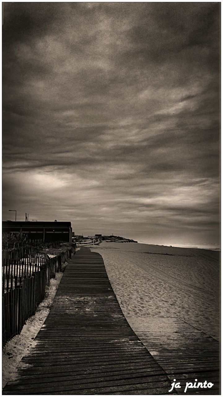 water, sky, sea, the way forward, pier, horizon over water, transfer print, cloud - sky, tranquility, tranquil scene, railing, cloudy, auto post production filter, diminishing perspective, scenics, nature, wood - material, cloud, boardwalk, beauty in nature