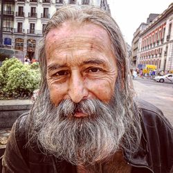 Portrait of man in city