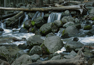 Stream flowing through rocks