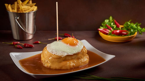 Close-up of food served in plate on table