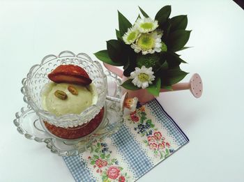 High angle view of various flowers in vase on table