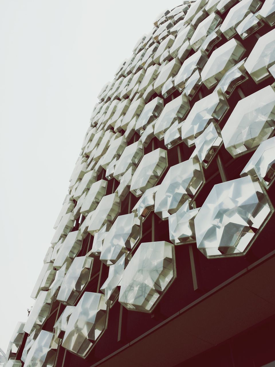 architecture, low angle view, building exterior, built structure, modern, in a row, clear sky, building, window, day, repetition, office building, no people, sky, city, residential building, pattern, residential structure, outdoors, copy space