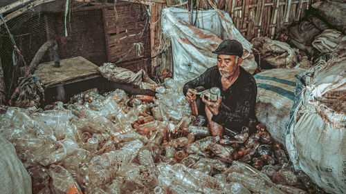 Plastic waste recycling workers at the supiturang malang indonesia garbage collection place