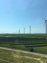 Scenic view of farm against sky