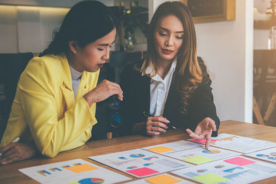 Businesswomen working together in office