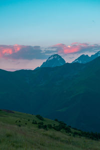 Scenic view of landscape against sky during sunset