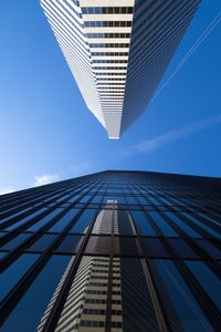 Low angle view of building against blue sky