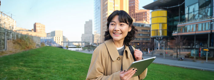 Young woman using mobile phone