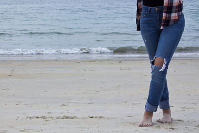 Hipster woman on the beach