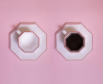 Directly above shot of electric lamp against pink background