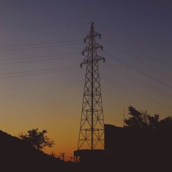 Low angle view of electricity pylon