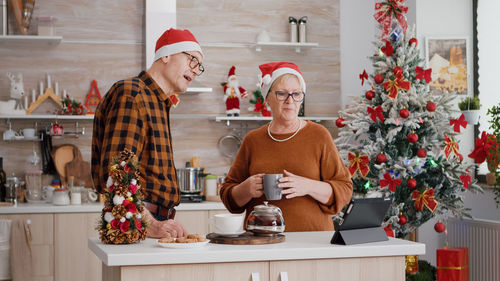 Group of people at christmas tree