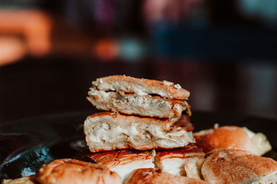 Close up of malaysian food roti john. made of eggs, minced meat, bread, served with melted cheese.