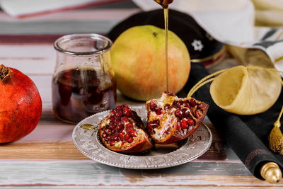 Close-up of fruits in plate on table