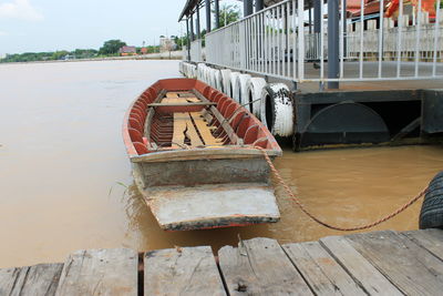 Boat moored on shore