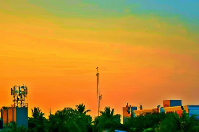 Low angle view of built structure at sunset