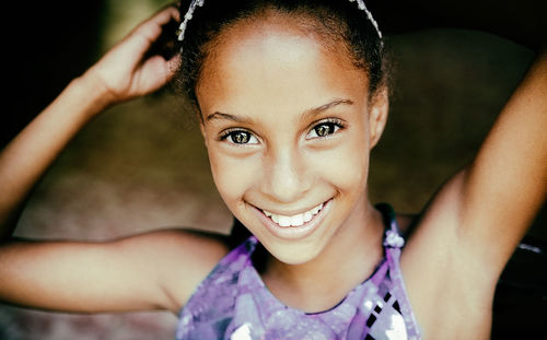 Close-up portrait of smiling girl