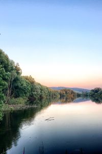 Scenic view of lake against clear sky