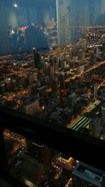 Illuminated cityscape at night
