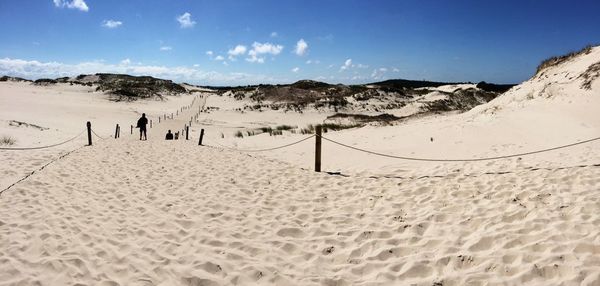 Scenic view of beach against sky