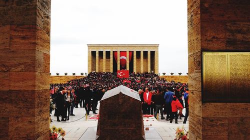 Group of people in front of historical building