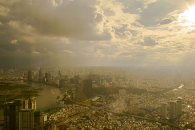 High angle view of buildings in city against sky