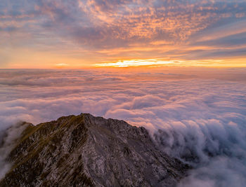 Scenic view of mountains against sky during sunset