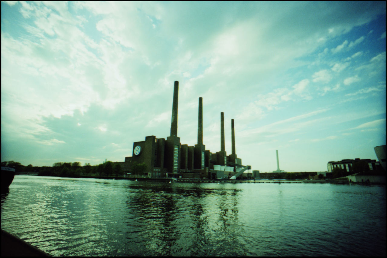 The Iconic Factory of Volkswagen in Wolfsburg 35 Mm Analogue Photography Architecture Autoindustrie Chimneys Factory And Lake Factory And Nature Four Chimneys Iconic Chimneys Tor 17 Volkswagen Diesel Volkswagen Factory Volkswagen Fraud Volkswagen Wolfsburg Wolfsburg Car Industry Diesel Cars Diesel Crisis Factory Factory Chimneys Iconic Buildings Phæno Tunnel Volkswagen Wolfsburgphaeno