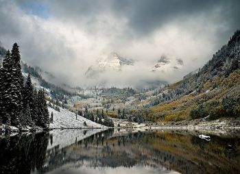 Scenic view of lake at maroon bells during winter