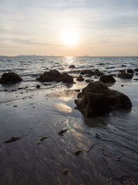 Scenic view of sea against sky during sunset