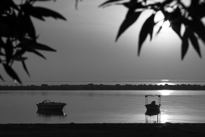 Boat on sea against clear sky
