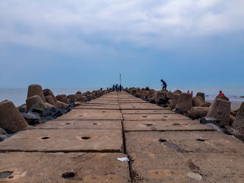 Panoramic view of pier amidst sea against sky