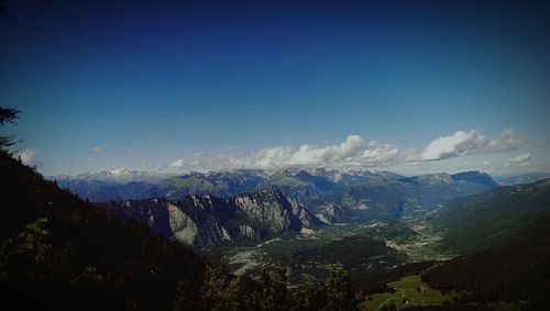 Scenic view of mountains against clear blue sky