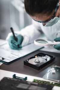 Female scientist working at crime laboratory