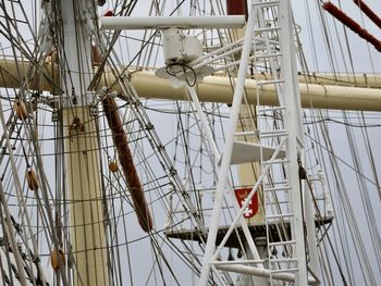 Close-up of sailboat moored in sea