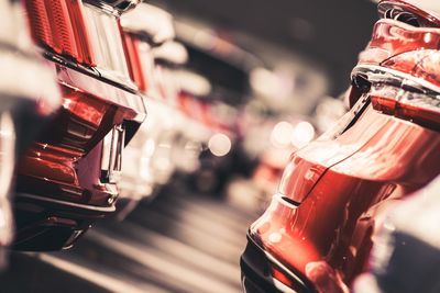 Cropped image of cars on road