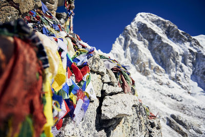 Prayer flags on the summit of kala patthar