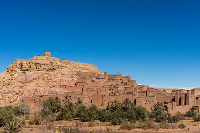 View of castle against clear blue sky