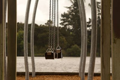 View of empty swing against sky
