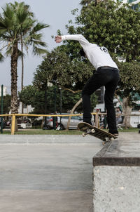 Man skateboarding on skateboard park